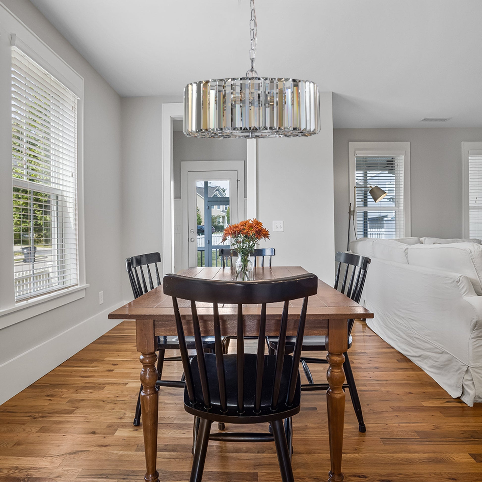 17' Chrome Crystal Pendant Chandelier with crystal prisms and chrome frame over a wooden table on Tampa Home & Garden Store