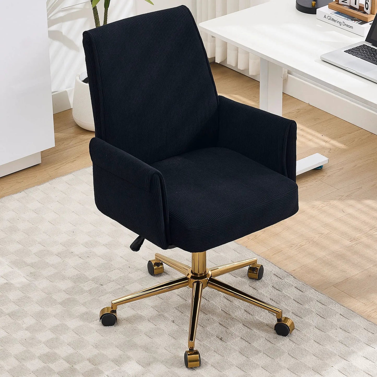 Ergonomic mid-back swivel office chair in black corduroy with a gold-tone base on Tampa Home & Garden Store