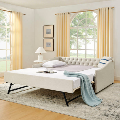 Upholstered daybed with pull-out trundle in beige fabric, tufted back and black metal legs on Tampa Home & Garden Store