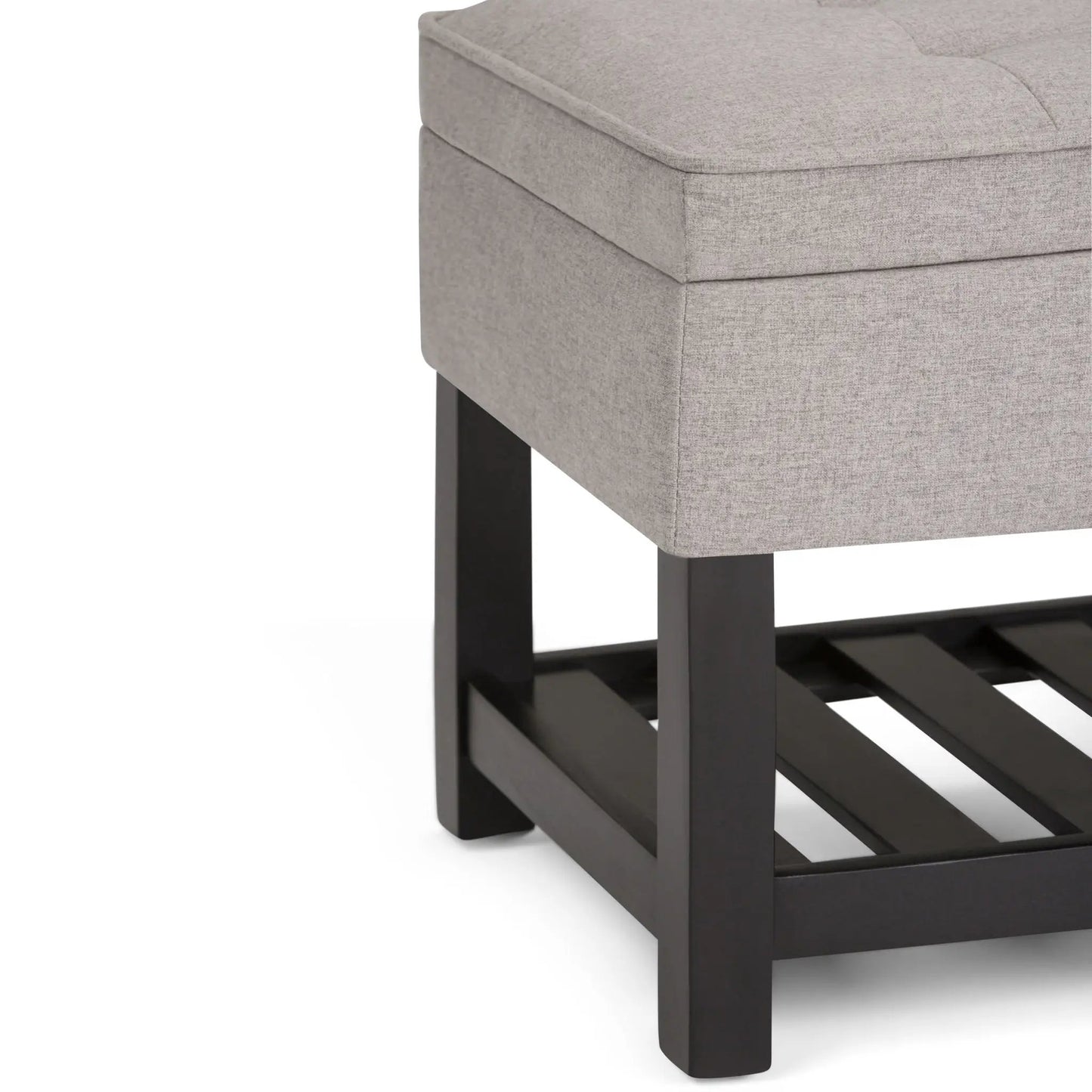 Cosmopolitan storage ottoman bench with open bottom, grey fabric, black legs on Tampa Home & Garden Store