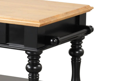 Kitchen island with light wood top and black base featuring turned legs on Tampa Home & Garden Store