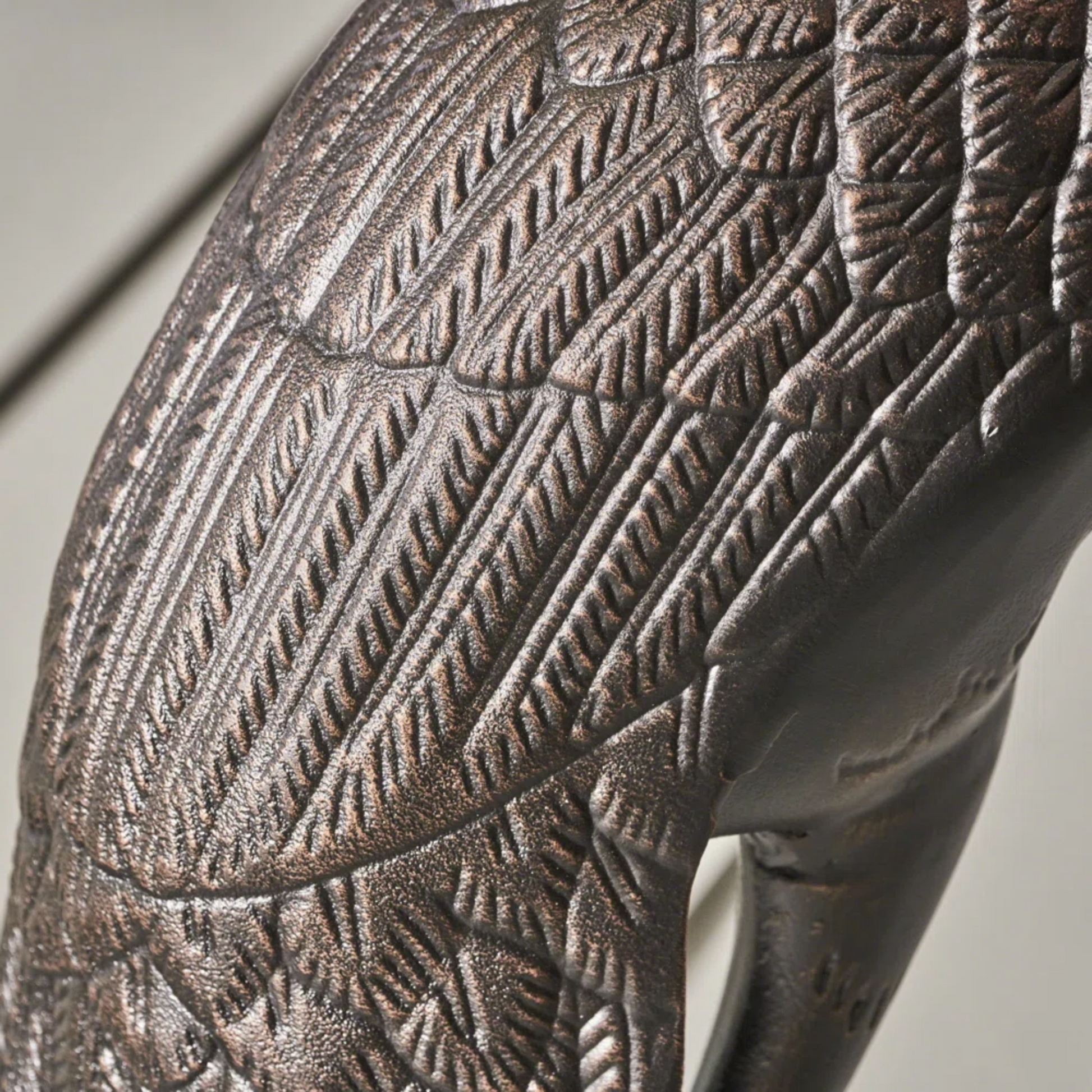 Cranes outdoor decor accessory close-up showing bronze textured feather pattern on Tampa Home & Garden Store
