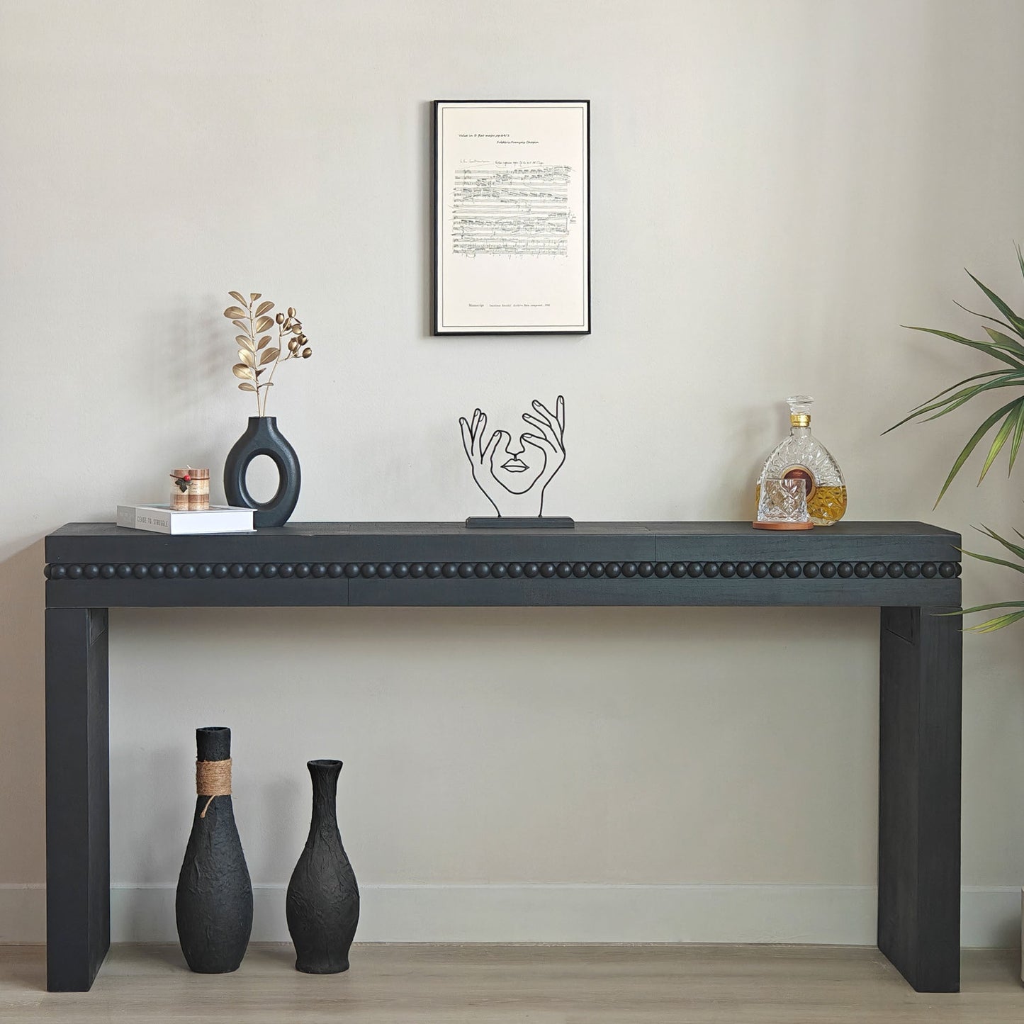 64in modern black wood console table with decorative beaded trim in an entryway setup on Tampa Home & Garden Store