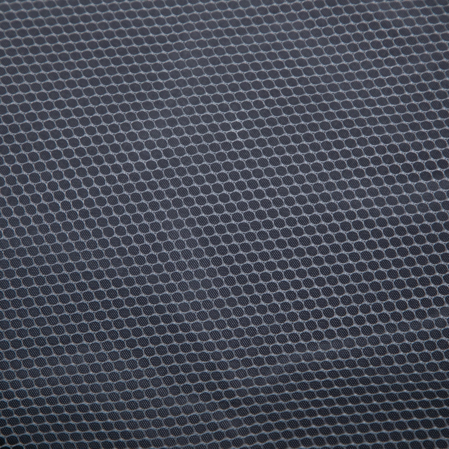 2-piece luggage set fabric close-up in dark blue-gray with circular dot texture on Tampa Home & Garden Store