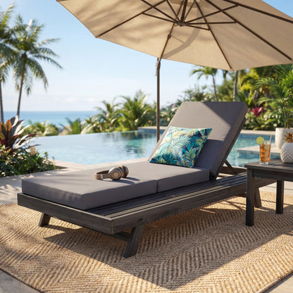 Acacia Wood Outdoor Chaise with Durable Cushion gray cushion and tropical leaf pillow by poolside on Tampa Home & Garden Store
