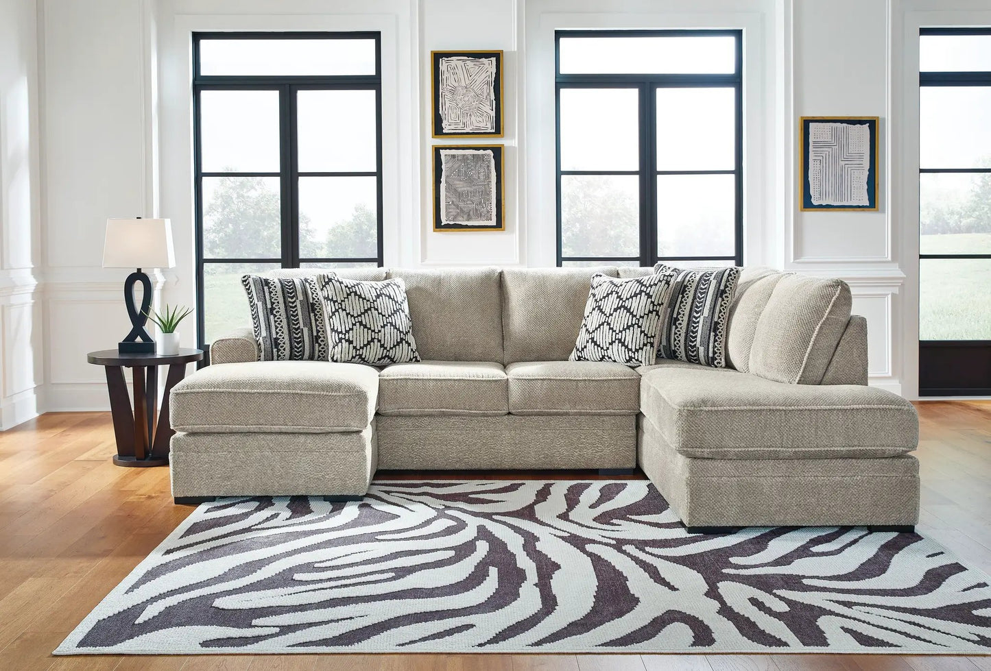 Calnita Stationary Sectional beige fabric by Unique Piece Furniture with patterned cushions on Tampa Home & Garden Store