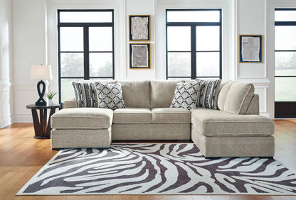 Calnita Stationary Sectional beige fabric by Unique Piece Furniture with patterned cushions on Tampa Home & Garden Store