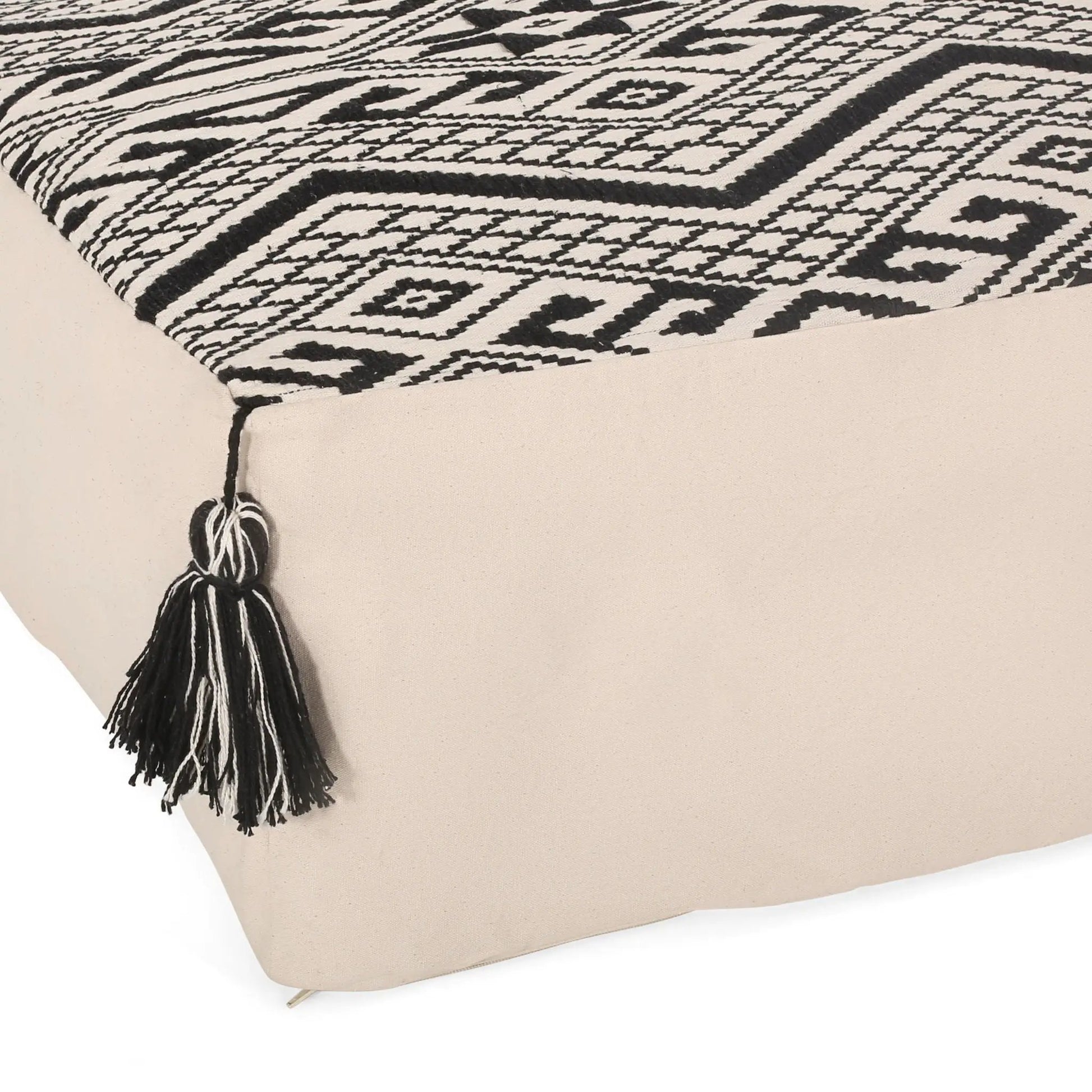 Kiki rectangular pouf ottoman black and natural woven pattern tassel fringe on Tampa Home & Garden Store