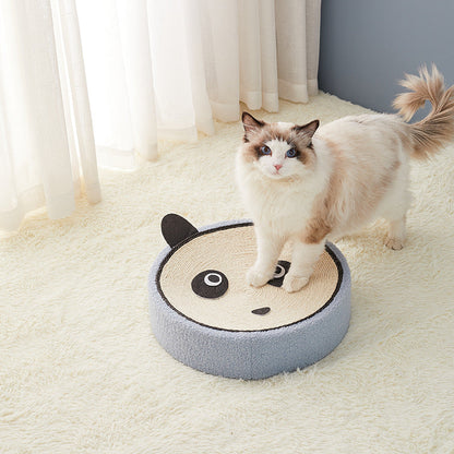 Round panda-themed cat scratcher with blue edge and beige corrugated center, cat standing on it on Tampa Home & Garden Store