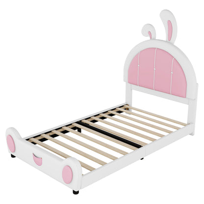 Upholstered platform bed with rabbit headboard, white frame and pink panel accents on Tampa Home & Garden Store