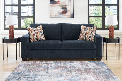 Aviemore stationary sofa by Unique Piece Furniture in dark blue upholstery with pillows on Tampa Home & Garden Store