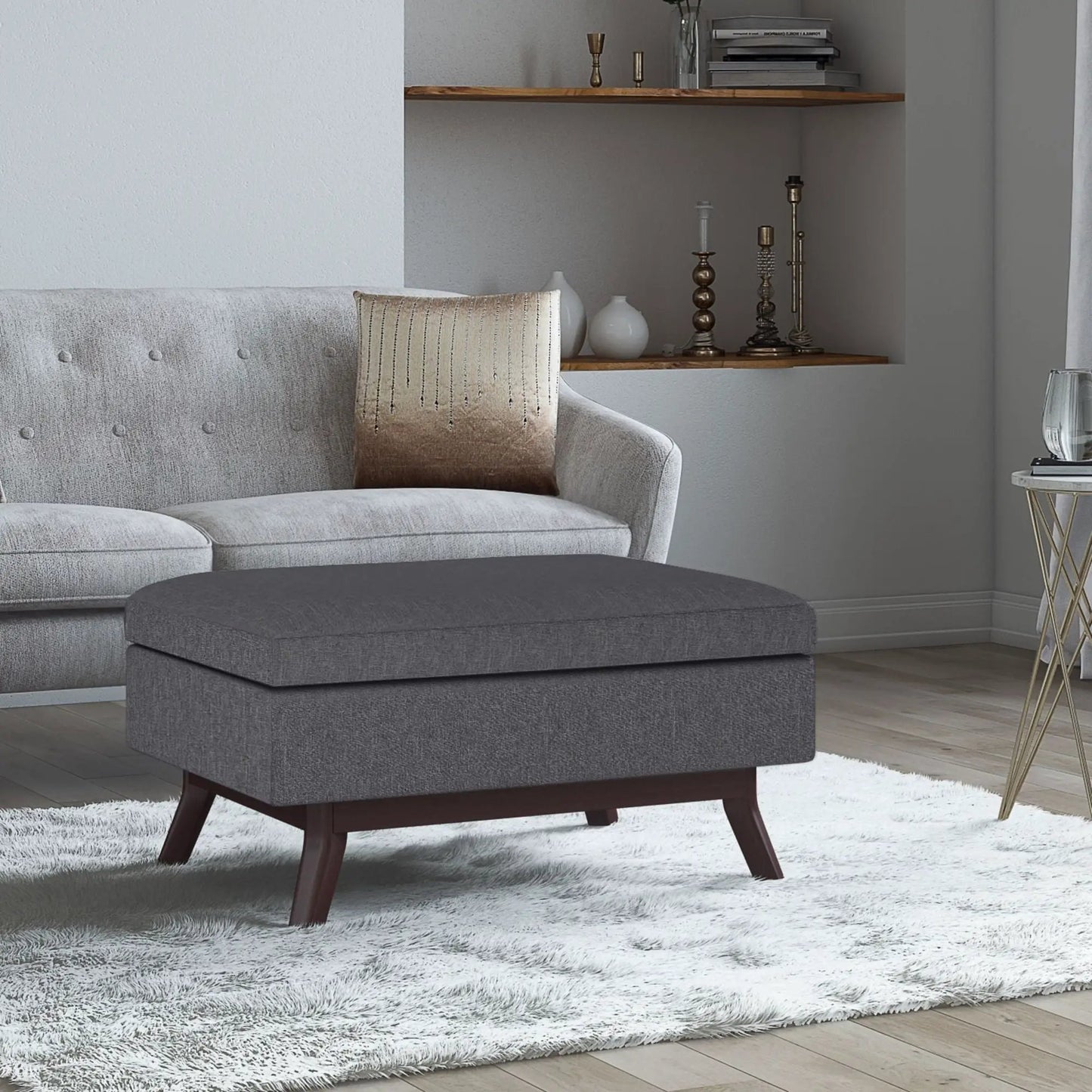 Owen upholstered rectangular storage ottoman in gray fabric with dark wood legs on Tampa Home & Garden Store