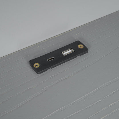 Platform bed frame mounting bracket with screws on gray wood surface on Tampa Home & Garden Store
