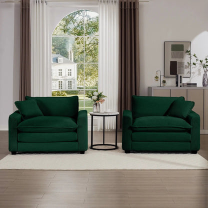 Two green Modern Classic Fabric Armchairs with pillows stand beside table under arch window on Tampa Home & Garden Store