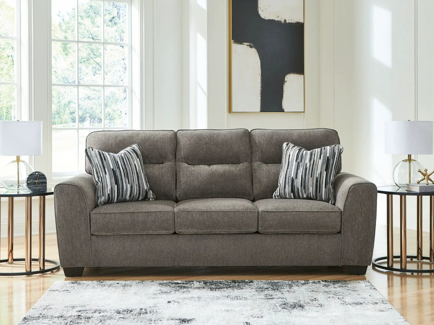 Olten sofa by Unique Piece Furniture, stationary grey fabric sofa with striped pair of pillows on Tampa Home & Garden Store