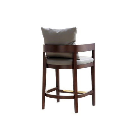 Mid-Century Modern counter stool with gray upholstered seat and curved wood frame on Tampa Home & Garden Store