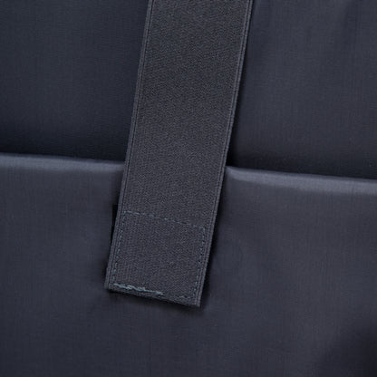 Luggage strap close-up on navy nylon strap against dark fabric background on Tampa Home & Garden Store
