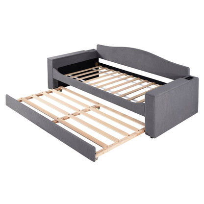 Upholstered gray daybed with storage armrests and built-in trundle, wooden slat base on Tampa Home & Garden Store