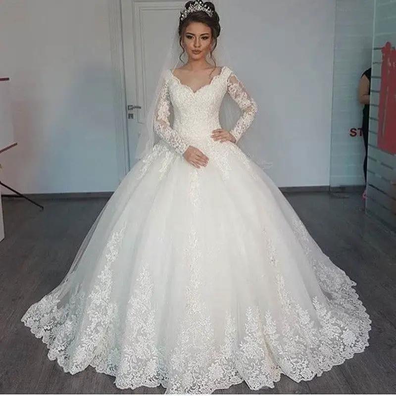 Women's long sleeve lace wedding dress by FLIPSTYLEZLLC, white ballgown with lace and veil on Tampa Home & Garden Store