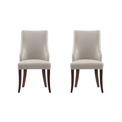 Set of 2 modern dining chairs in light gray upholstery with dark wood legs on Tampa Home & Garden Store