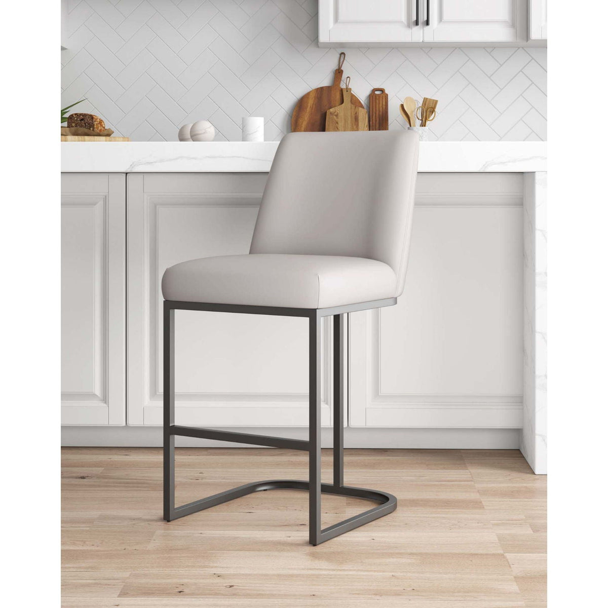 Serena Counter Stool with light gray upholstery and dark metal cantilever base, 24–27 in on Tampa Home & Garden Store