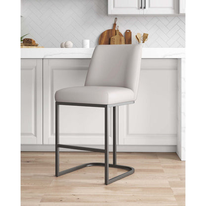 Serena Counter Stool with light gray upholstery and dark metal cantilever base, 24–27 in on Tampa Home & Garden Store