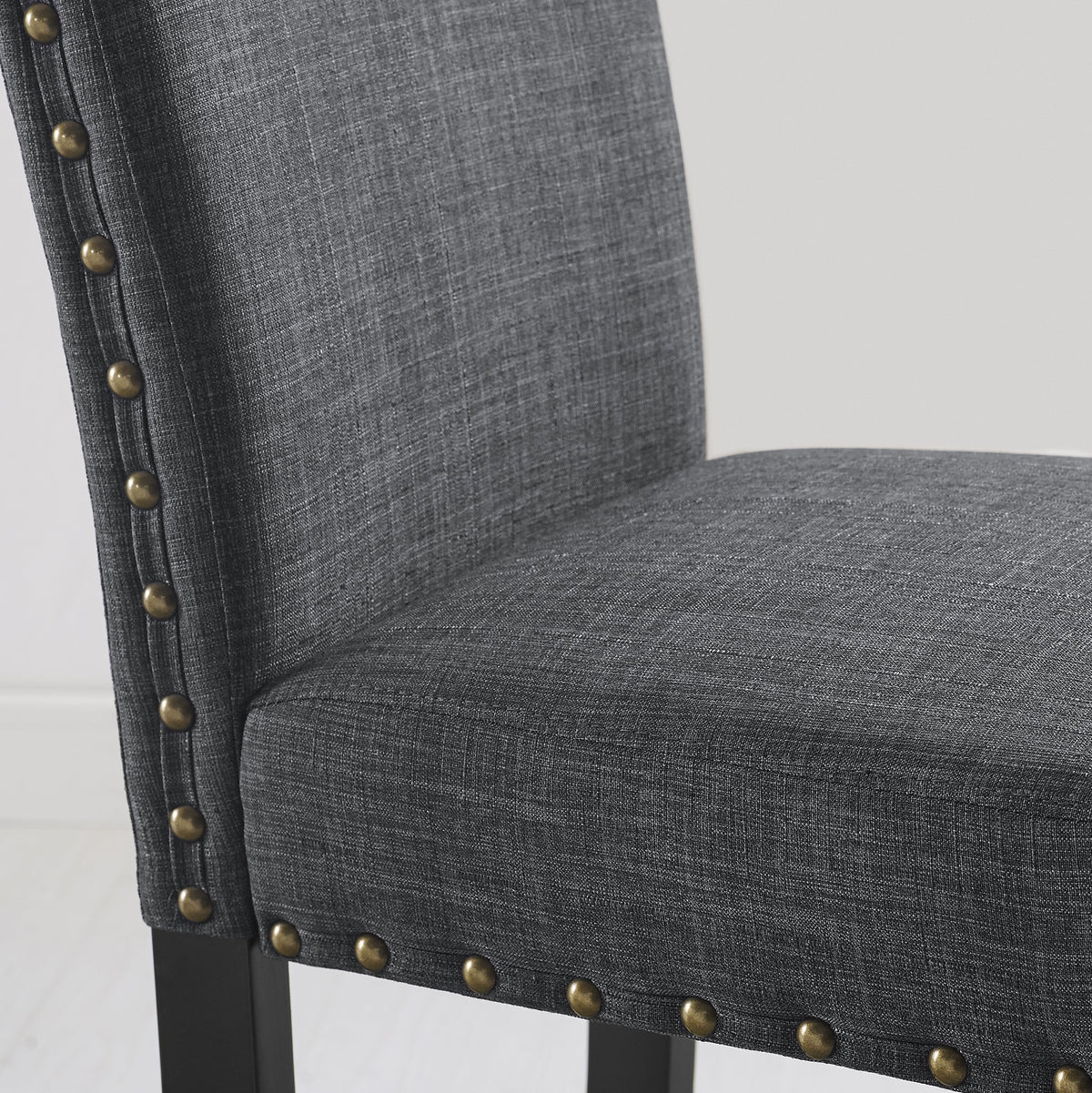 Biony espresso wood dining chair in gray fabric with brass nailhead trim HouseOfZazla on Tampa Home & Garden Store