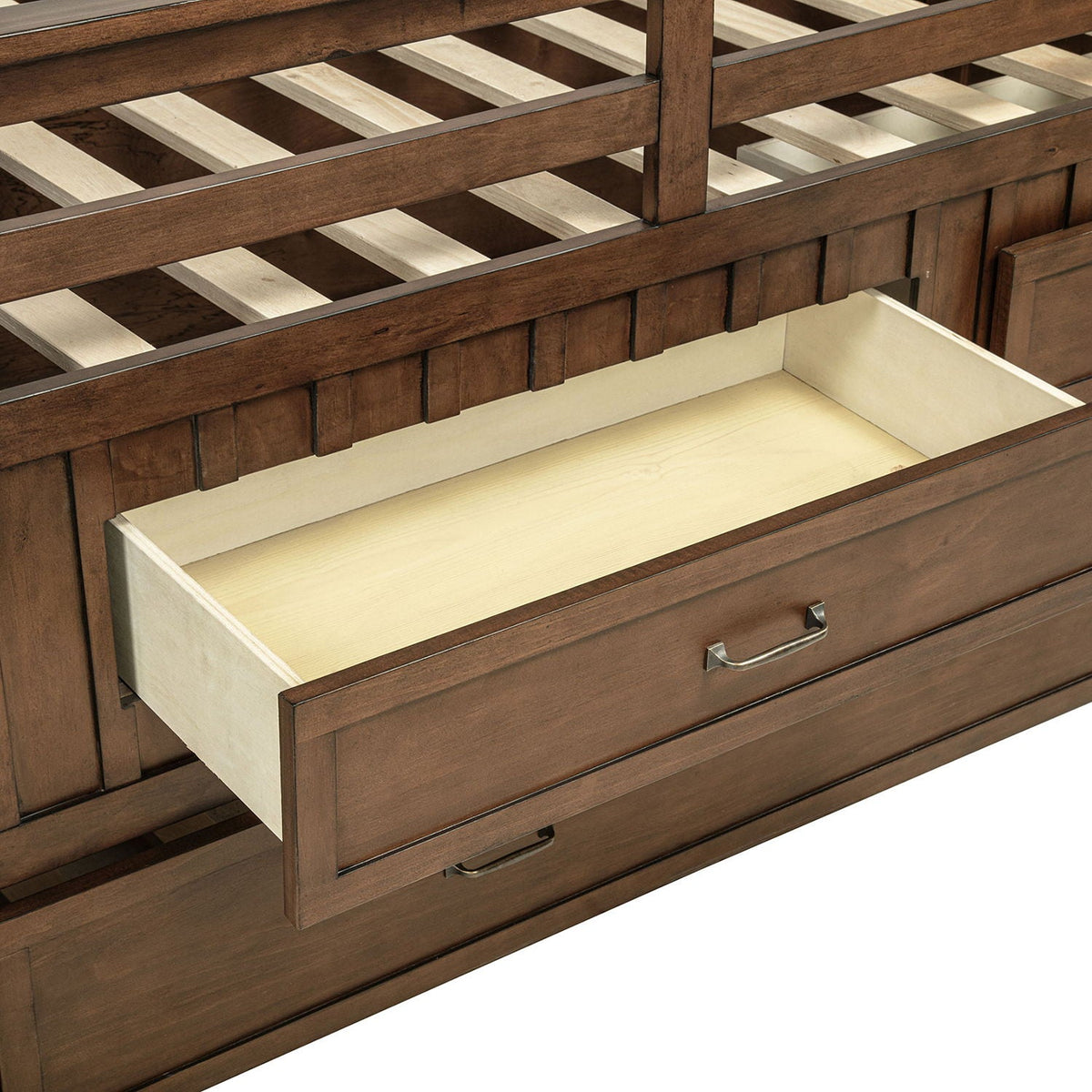 Starboard Captain's Bed with Trundle in dark brown wood with slatted rails and an open pull-out trundle drawer on Tampa Home & Garden Store