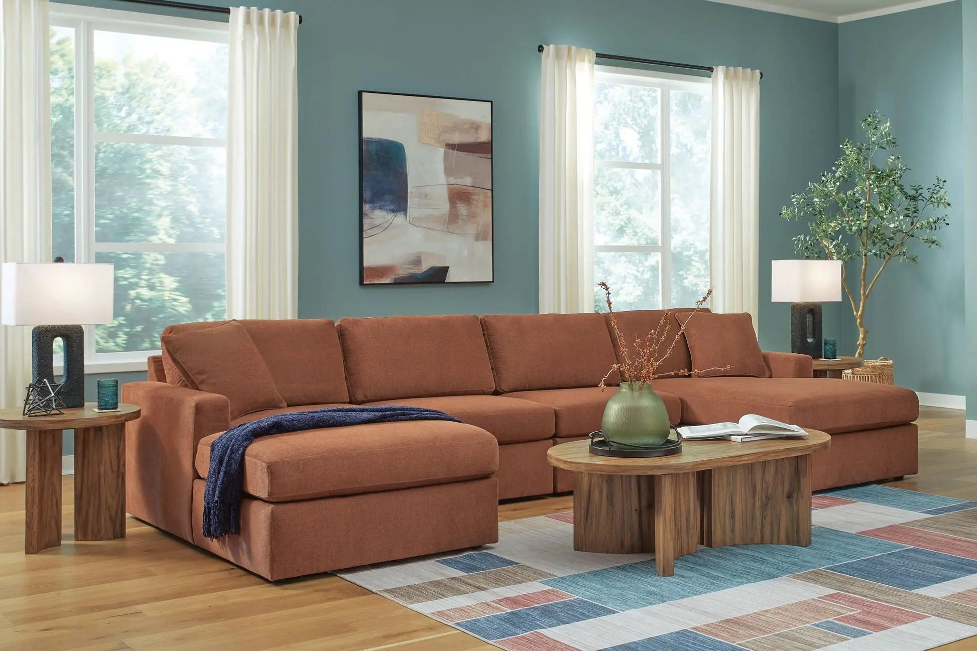 Modmax Spice Sectional Sofa burnt orange by Unique Piece Furniture in a bright living room on Tampa Home & Garden Store