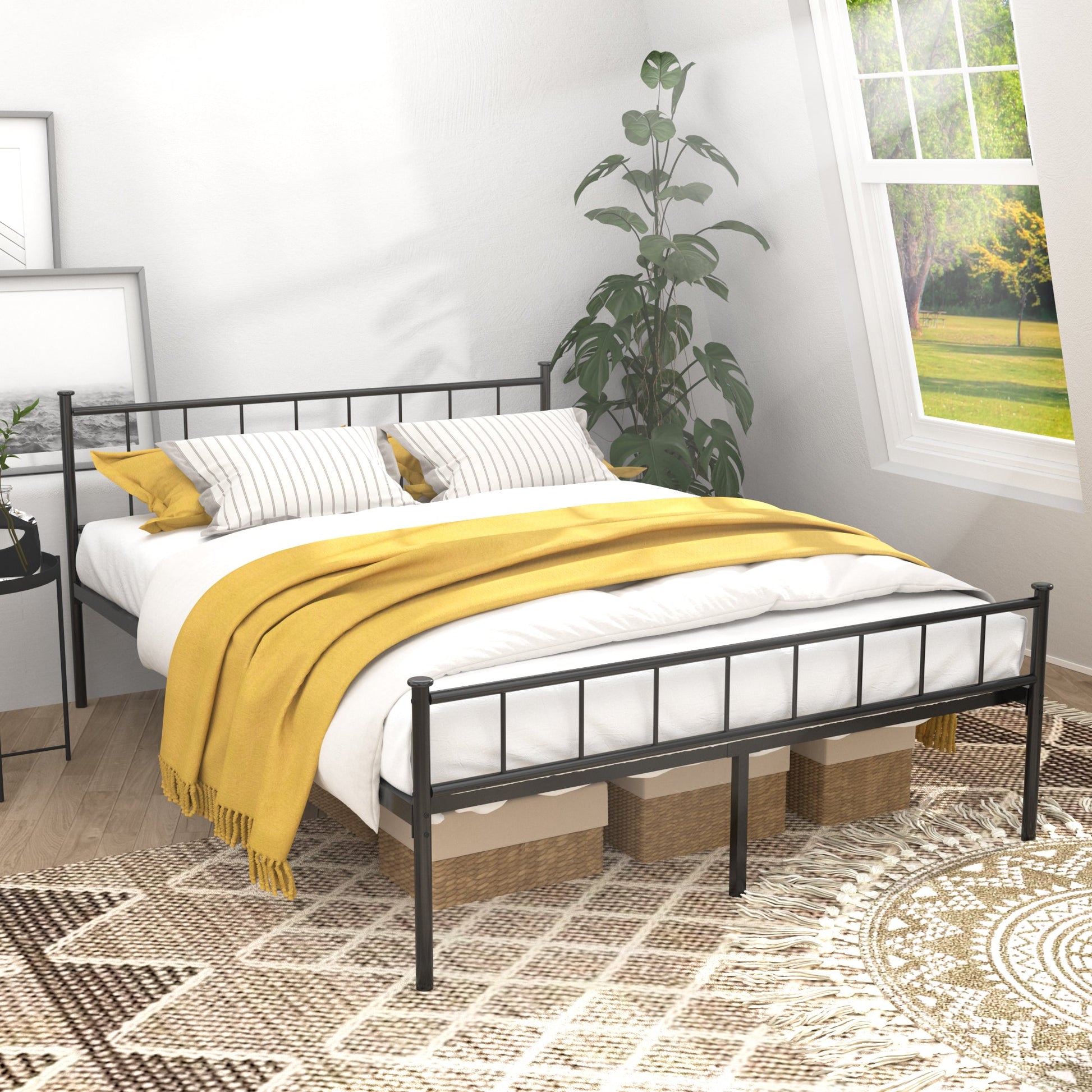 Queen Size Bed Frame with headboard and footboard in black metal, white linens and yellow throw on Tampa Home & Garden Store