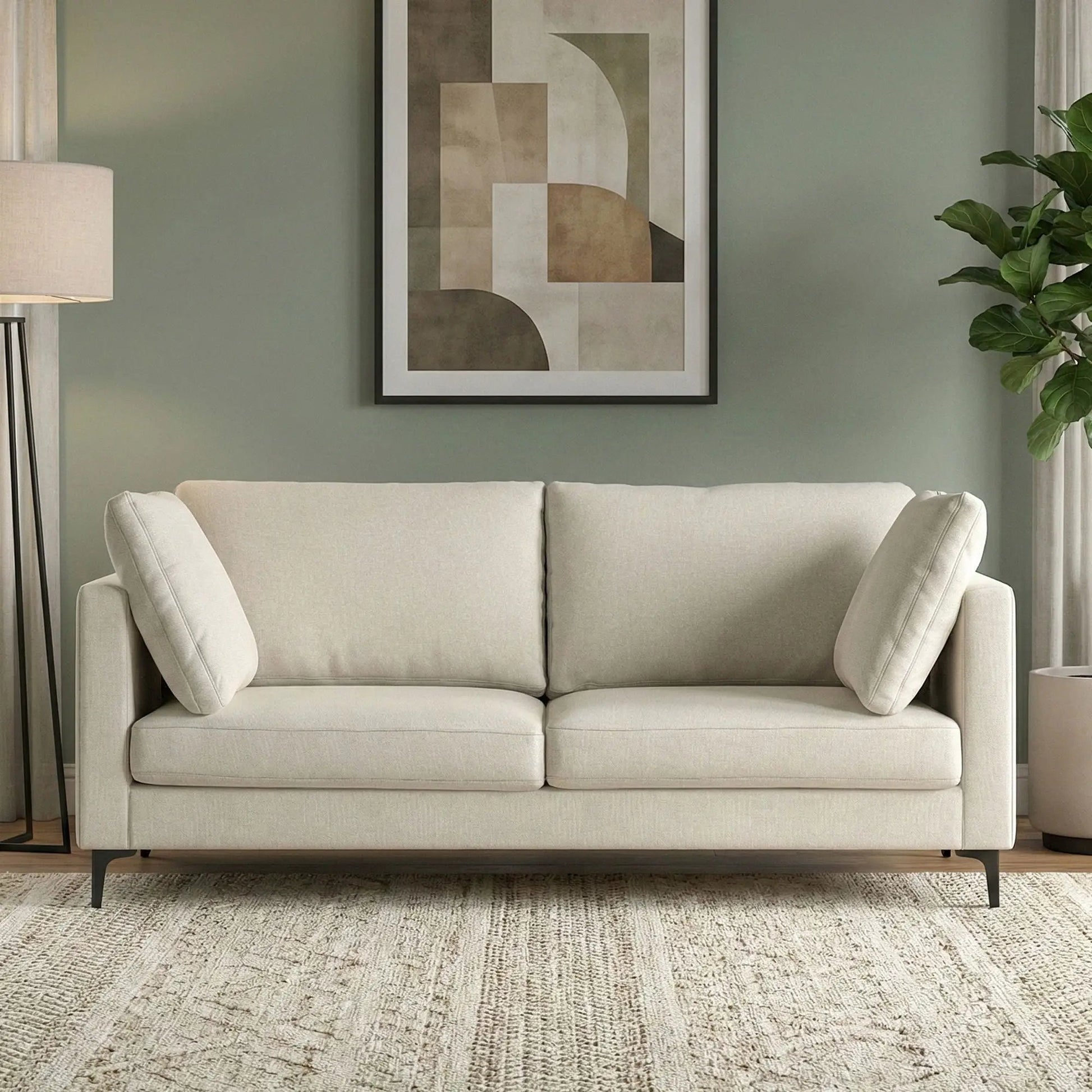 Ava mid-century upholstered sofa with light beige fabric and slim black metal legs on Tampa Home & Garden Store