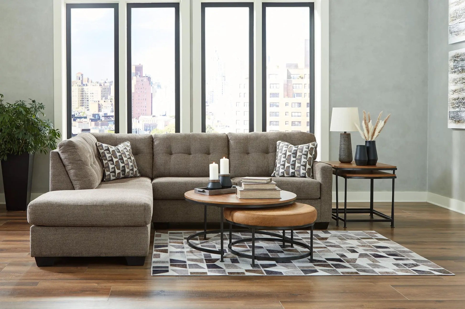 Mahoney stationary sectional in taupe fabric with geometric pillows Unique Piece Furniture on Tampa Home & Garden Store