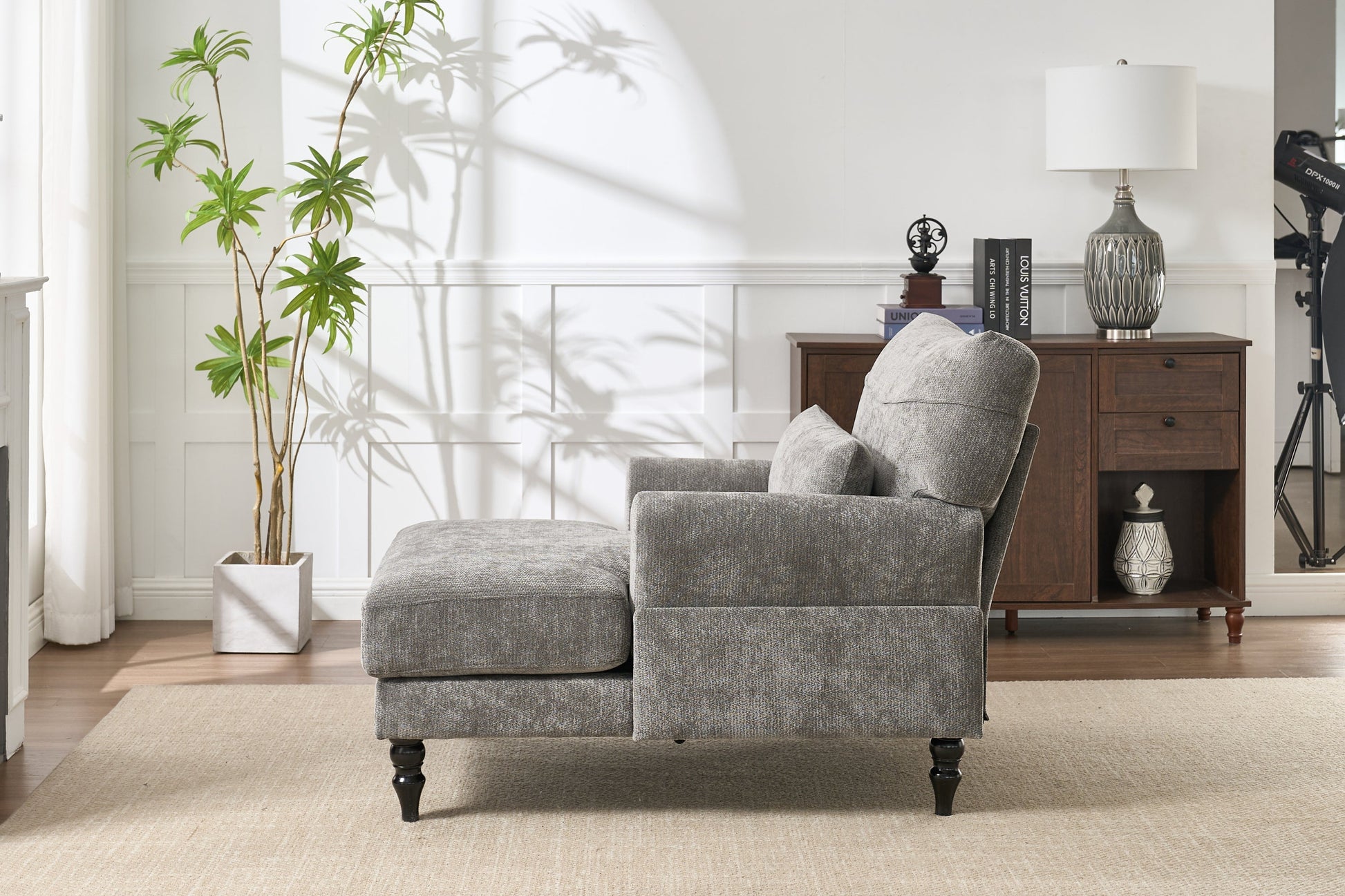 Modern grey upholstered chaise lounge sofa by HouseOfZazla, fabric texture and dark turned legs on Tampa Home & Garden Store