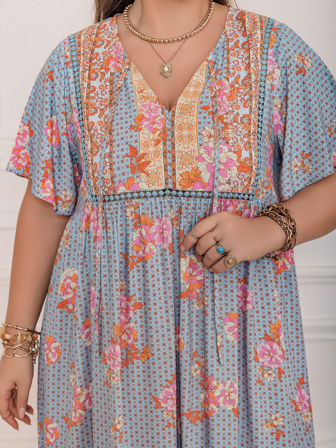 Stevvex plus size printed flutter sleeve maxi dress blue floral with pink orange accents v-neck on Tampa Home & Garden Store
