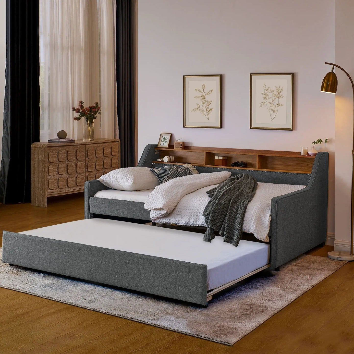 Upholstered sofa bed in gray fabric with storage headboard and foldable trundle on Tampa Home & Garden Store