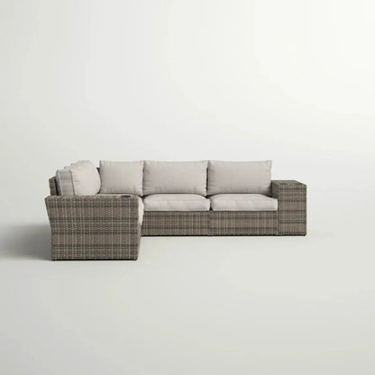 Wide outdoor wicker patio sectional with gray cushions, stationary, reversible design on Tampa Home & Garden Store