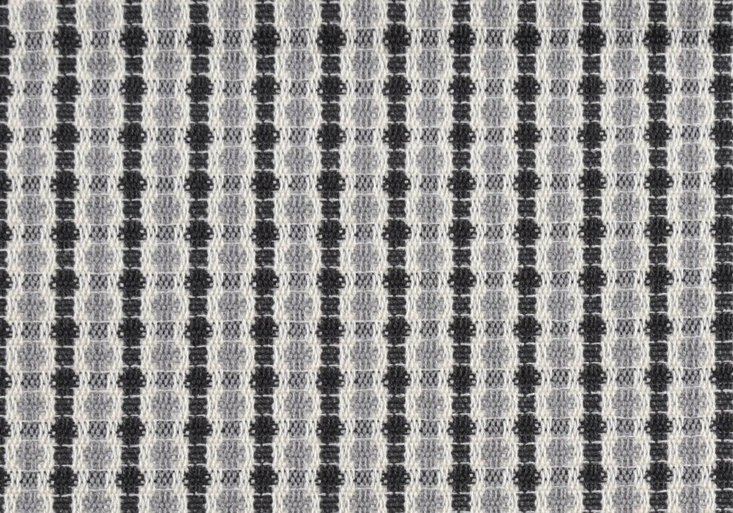 Square decorative throw pillow fabric with a black and gray geometric weave on Tampa Home & Garden Store
