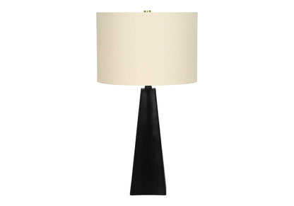 Table lamp with black resin base and beige fabric drum shade on Tampa Home & Garden Store