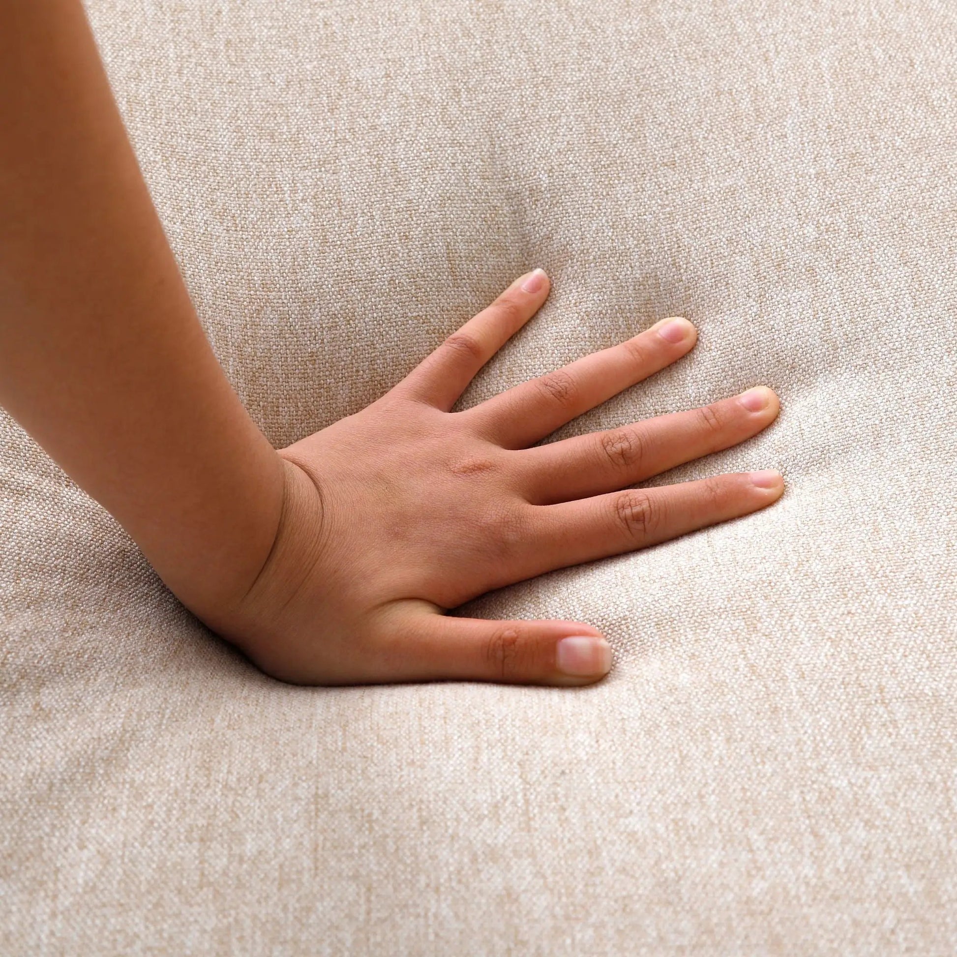 L-Shaped Reversible Chaise Sectional Sofa Storage beige woven upholstery; hand for scale on Tampa Home & Garden Store