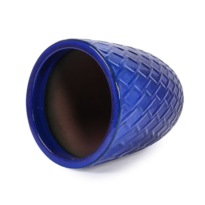 Blue ceramic planter with diamond-textured surface and curved rim for patio or windowsill on Tampa Home & Garden Store