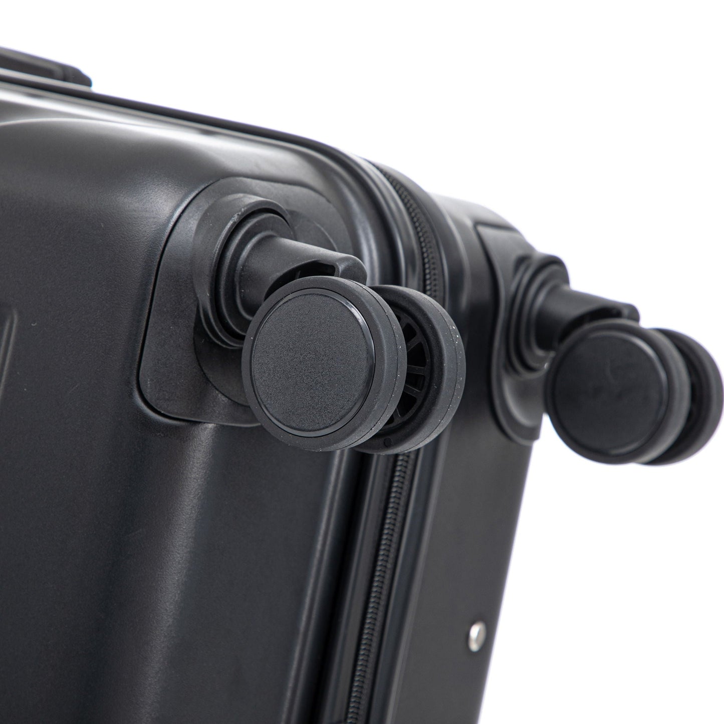 Spinner wheel close-up on black hard-shell luggage on Tampa Home & Garden Store