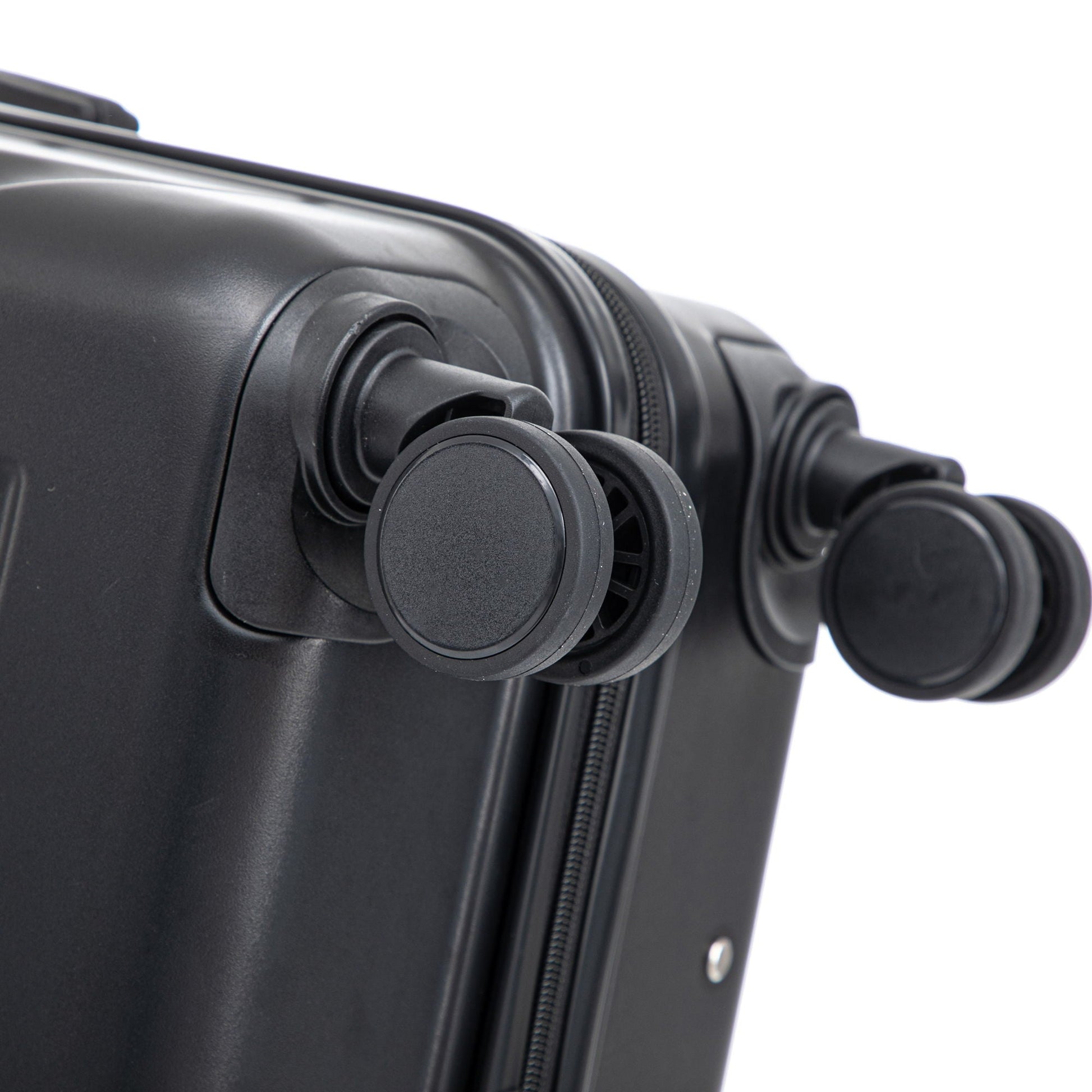 Spinner wheel close-up on black hard-shell luggage on Tampa Home & Garden Store