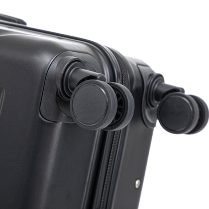 Spinner wheel close-up on black hard-shell luggage on Tampa Home & Garden Store
