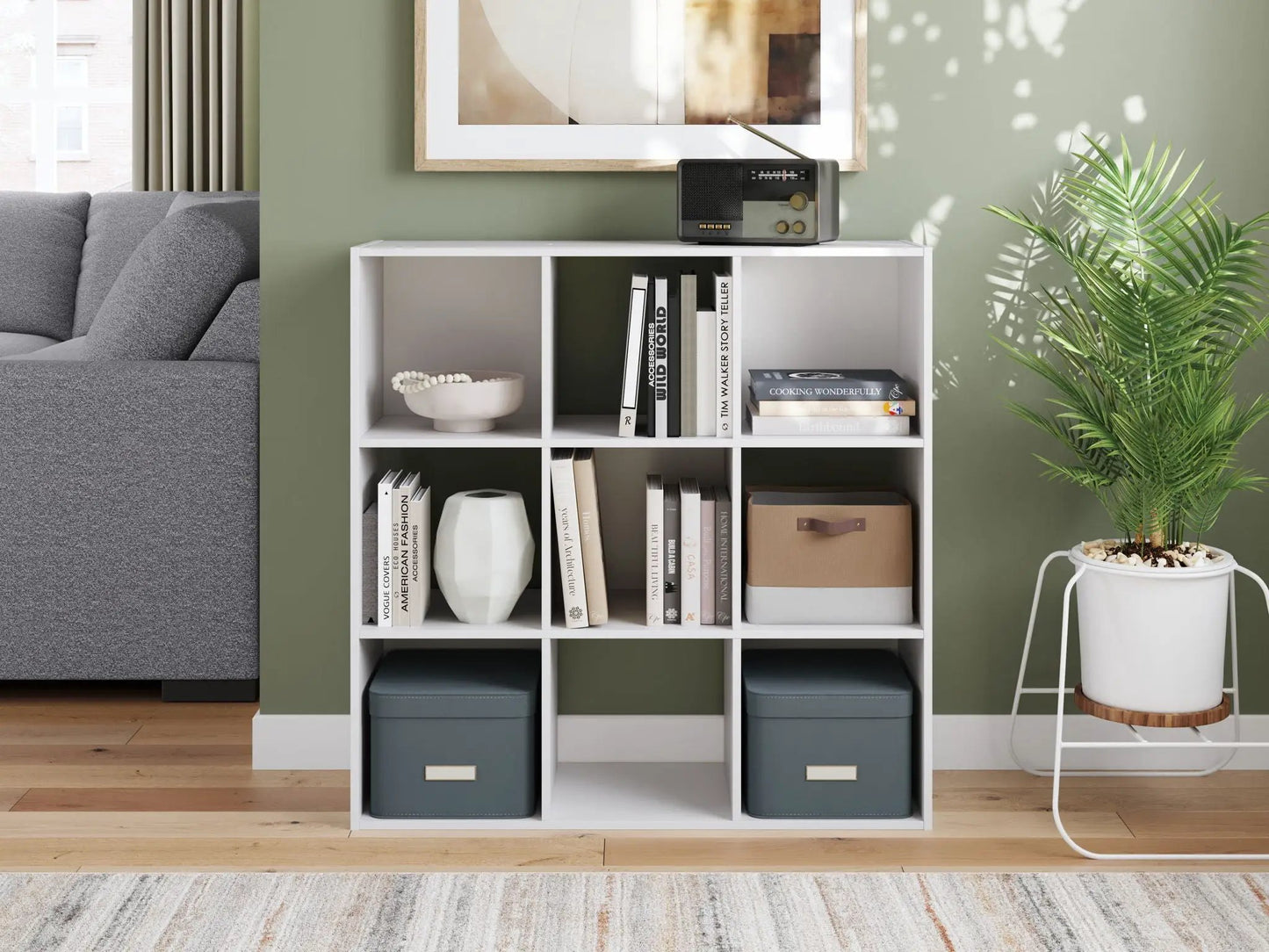 Onita cube organizer by Unique Piece Furniture, white frame with blue bins and a retro radio on Tampa Home & Garden Store