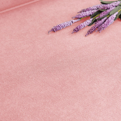 Lavender sprigs with purple blooms and green leaves on pink fabric surface HouseOfZazla on Tampa Home & Garden Store