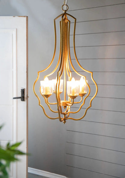 4-light gold metal chandelier with glass candle cup shades and hanging chain on Tampa Home & Garden Store