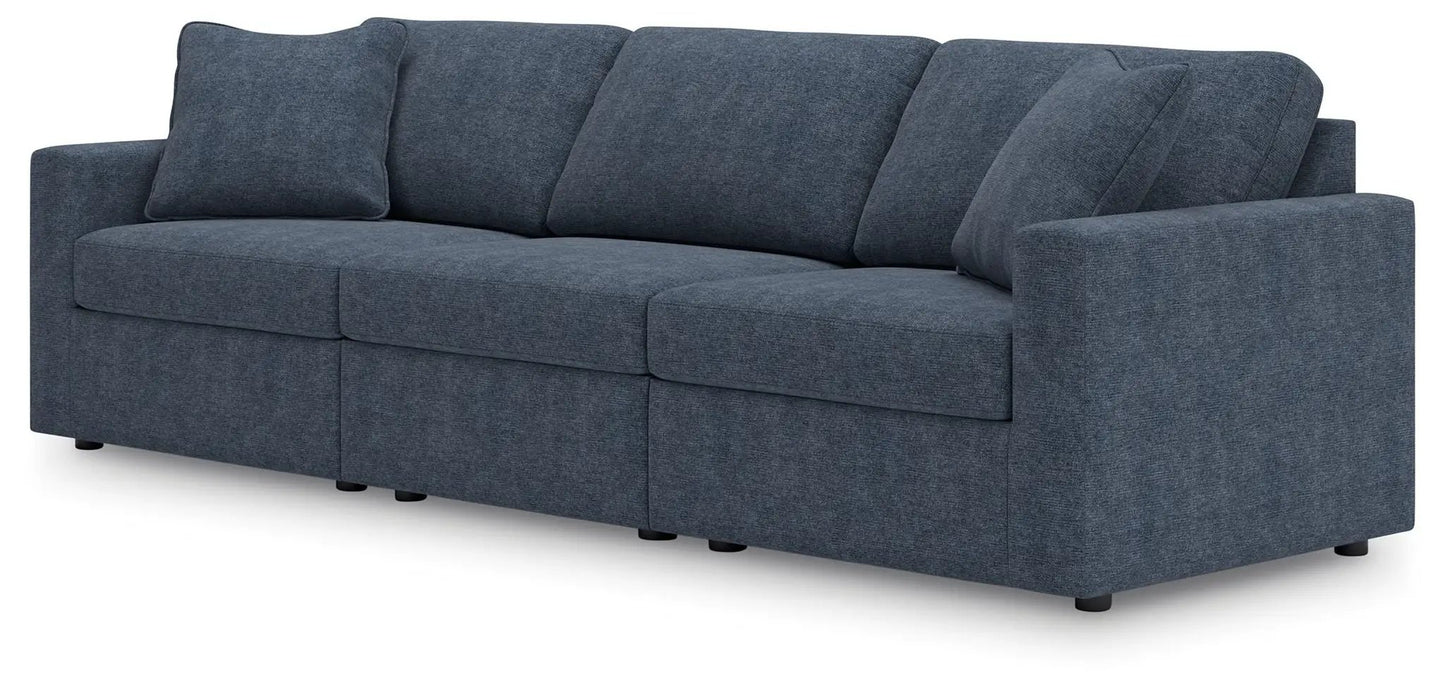 Modmax sectional Ink in blue fabric with three back cushions and one throw pillow on Tampa Home & Garden Store
