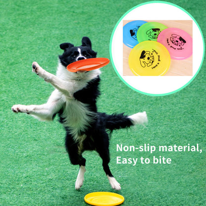 Silicone flying saucer dog toy; orange disc caught by a dog on green grass; inset shows discs on Tampa Home & Garden Store