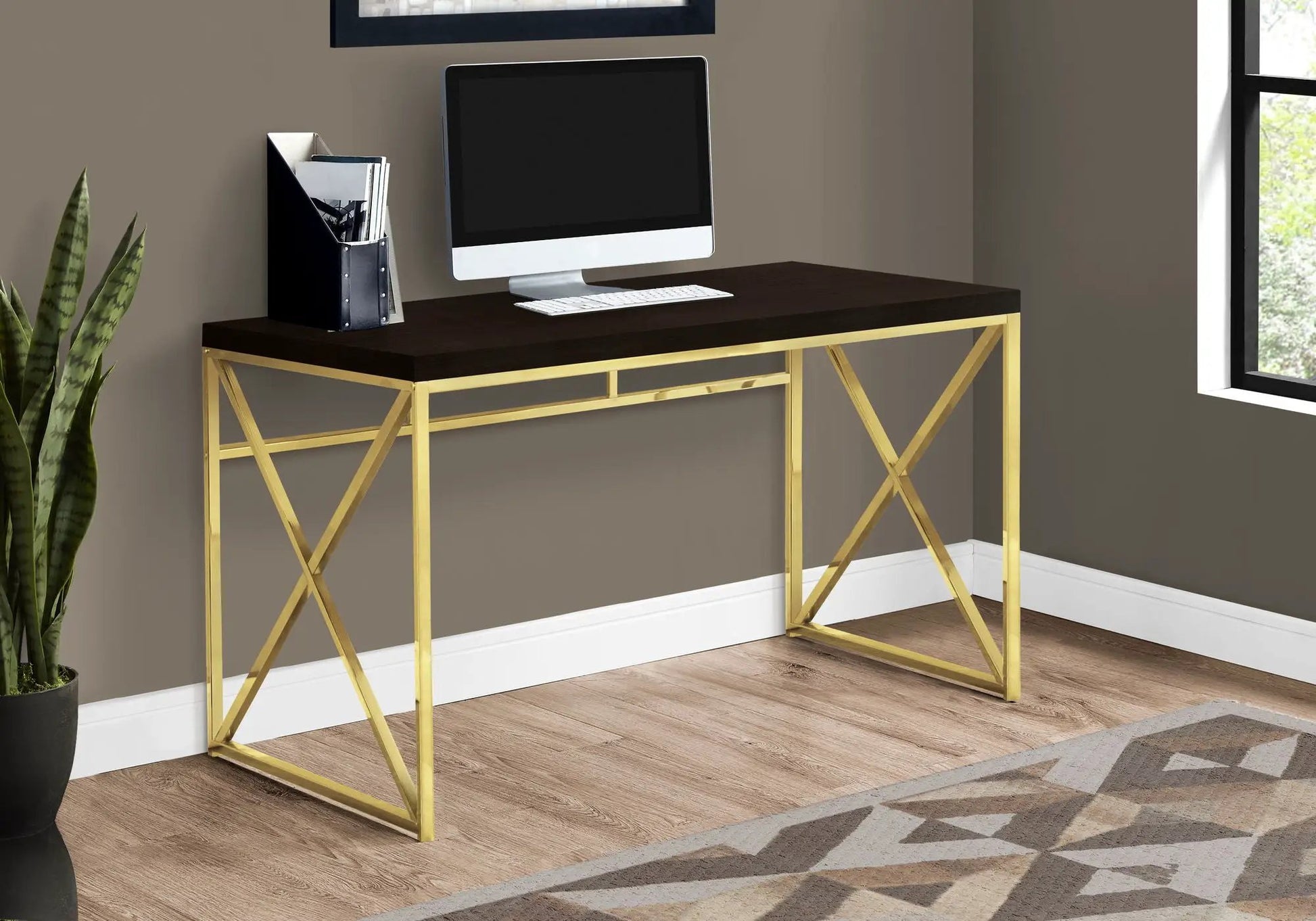 Computer desk with dark wood top and gold metal frame featuring an iMac and file organizer on Tampa Home & Garden Store