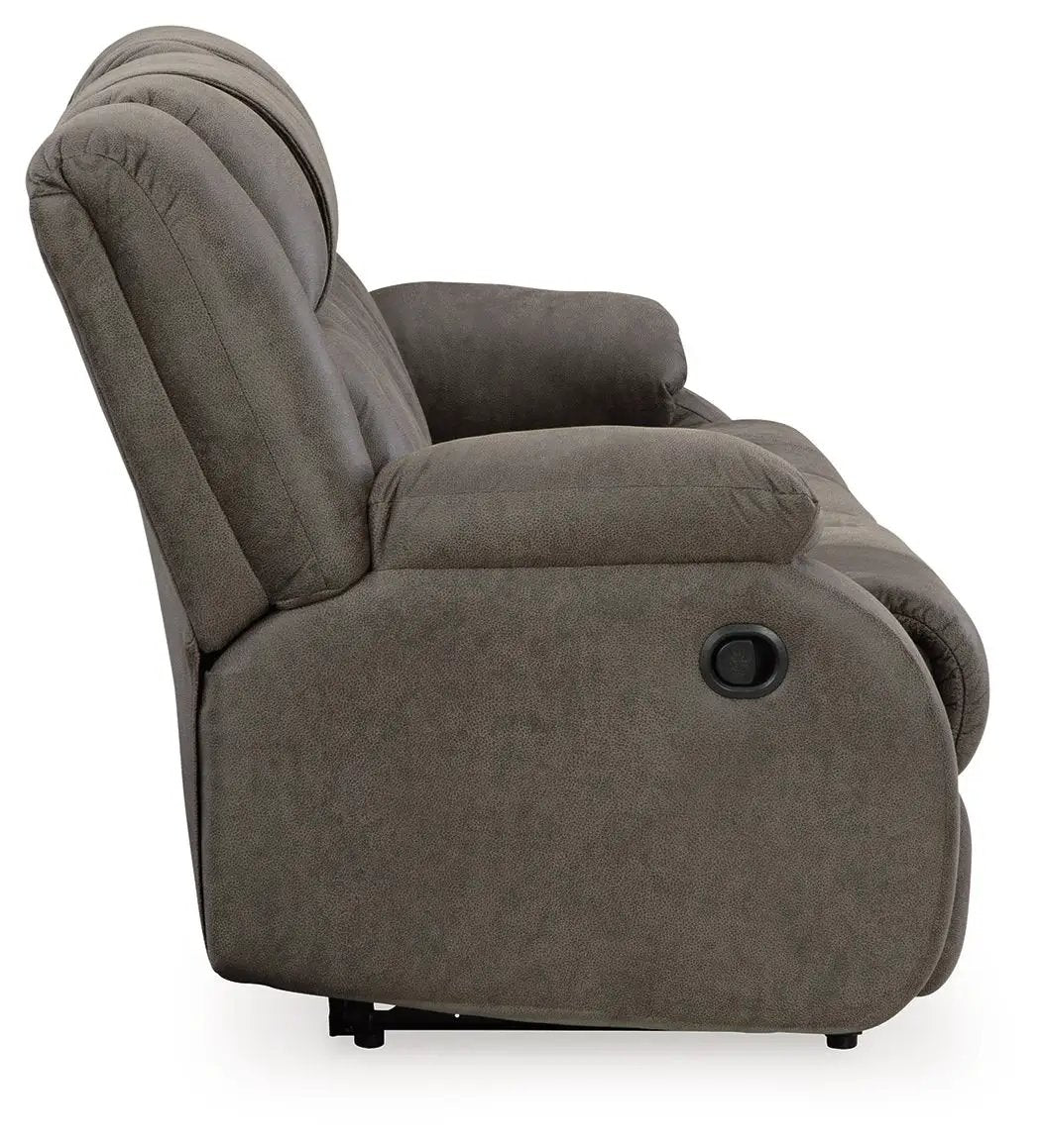 First Base reclining sofa gunmetal gray with plush cushions and side view on Tampa Home & Garden Store